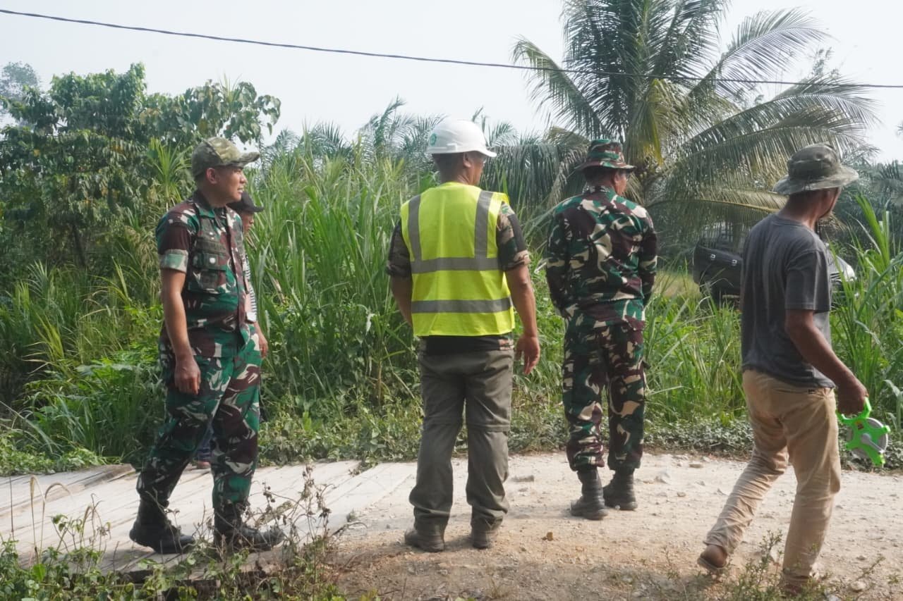 Jalan Baru Hasil Program TMMD Membawa Harapan bagi Petani Parumpanai