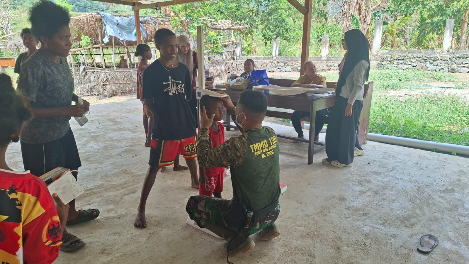Program TMMD dan Dinkes Mantapkan Pemantauan Pertumbuhan Anak di Yamboi