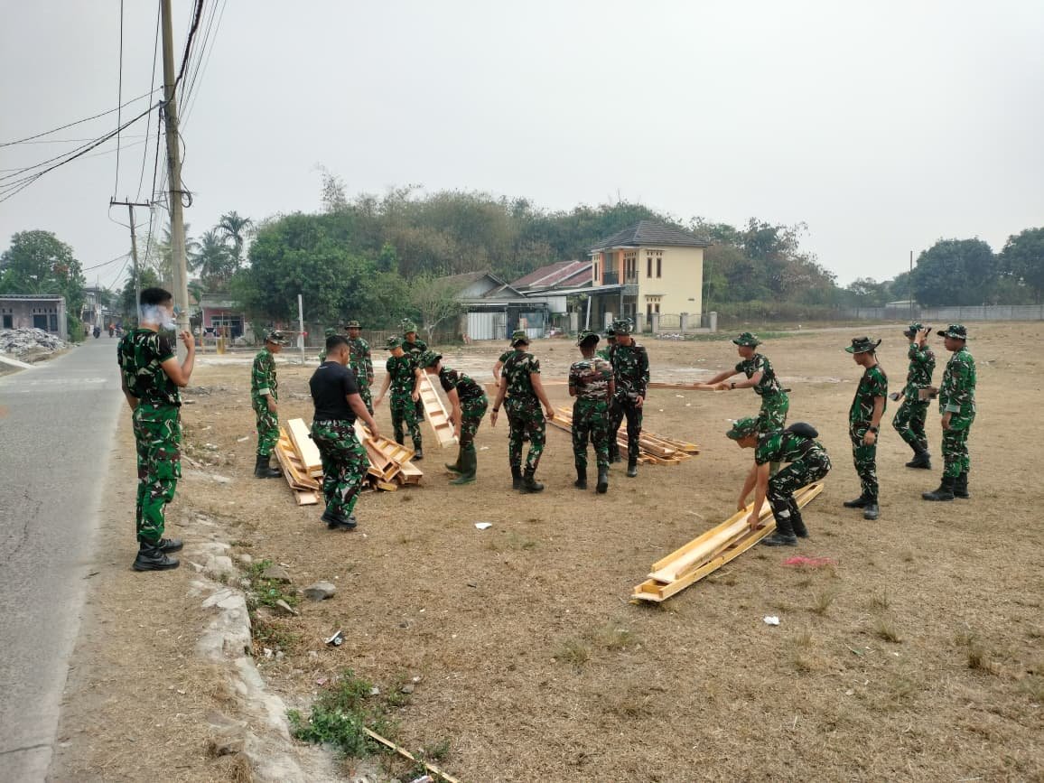 Peran Kritis Pengangkutan Bekisting dalam Pembangunan Infrastruktur Desa TMMD